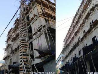 Struktur bangunan bertingkat lima proyek Morison Hotel di Bengkalis tampak dikelilingi perancah kayu tanpa pagar pelindung atau jaring pengaman, diambil pada 13 Oktober 2025.