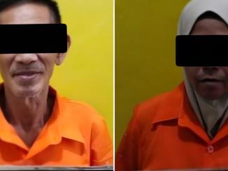 Dua tersangka pasangan suami istri yang diduga menampung lima PMI ilegal diperlihatkan di Polres Bengkalis